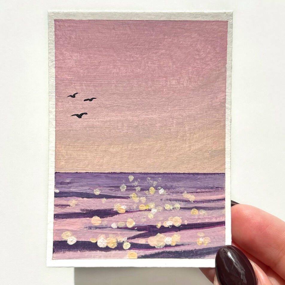 pink aceo sold sold pink seascape aceo, showing a pink sea surface with glowing ripples and pink sky with 3 birds flying. painting showed held by hand.