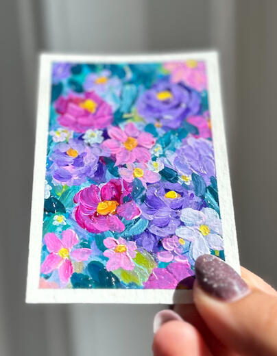 pink floral aceo mini hand holding aceo sized floral painting in hues of pink lilac blue and green